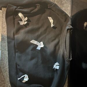 Elegant Black Sweater with Ribbon Accents